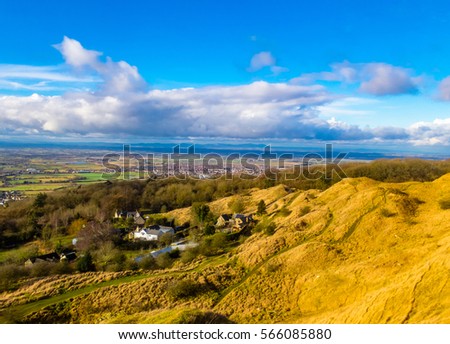 A walk up Cleeve Hill near Cheltenham in Gloucestshire, with Cleeve Hill being the highest point in the Cotwolds Royalty-Free Stock Photo #566085880
