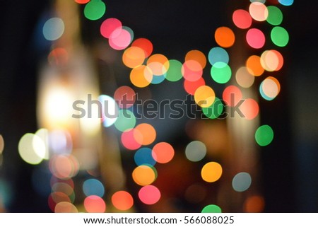Out of focus of many color of lights in the cold night at the city,round,blurred light,abstract background,street light,colorful light,blurred vision background.