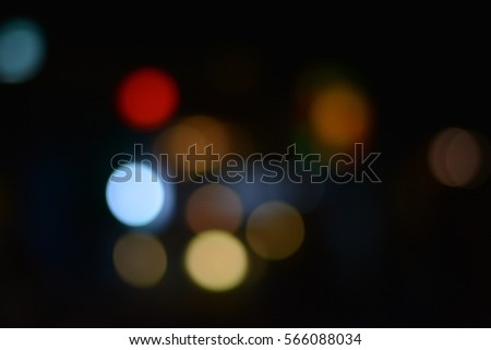 Out of focus of many color of lights in the cold night at the city,round,blurred light,abstract background,street light,colorful light,blurred vision background.