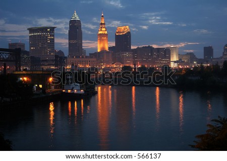 An early morning skyline view of Cleveland, Ohio reflecting on the Cuyahoga River.