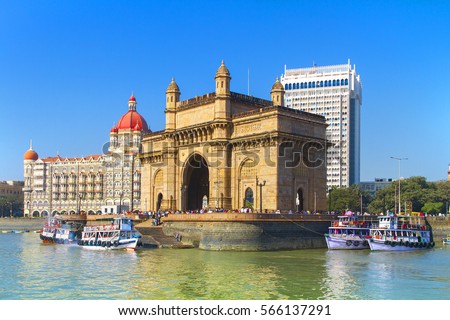 The Gateway of India and boats as seen from the Mumbai Harbour in Mumbai, India Royalty-Free Stock Photo #566137291