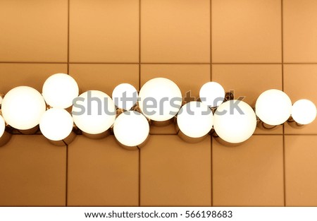 photo of set of light bulbs on a ceramic tile
