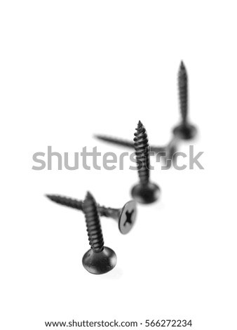 Screws and bolts on white background 