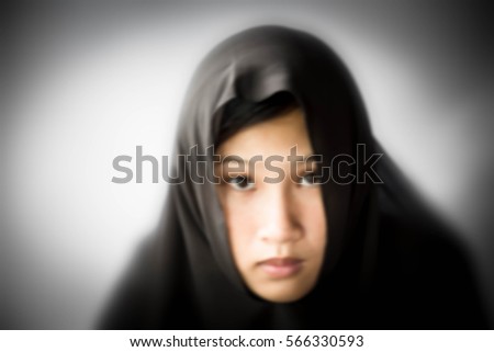 Blurry portrait of a young  woman,Immigrant
