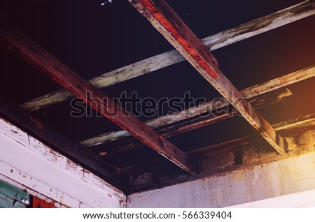 Old Rustic Wooden Cross Beam Rafters from an Old Abandoned Building
