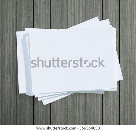 White Paper On Wood Table Of The Background