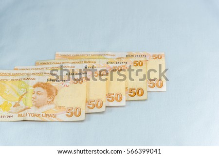 Different Turkish Coins and banknotes in different sizes and shapes