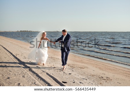 couple in love on the beach on their wedding day