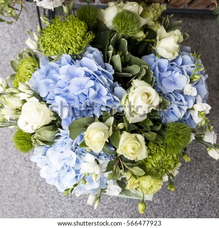 Large beautiful bouquet of hydrangeas. Flower arrangement in blue and green tones. Top view