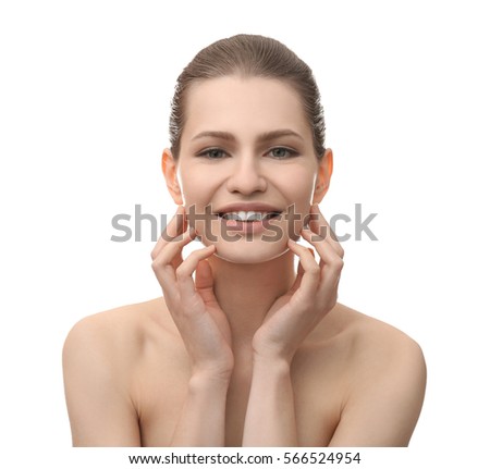 Young beautiful woman on white background. Plastic surgery concept