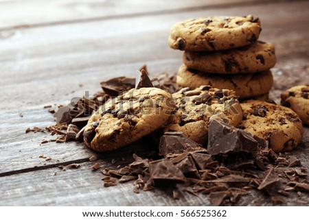 Chocolate cookies on wooden table. Chocolate chip cookies shot