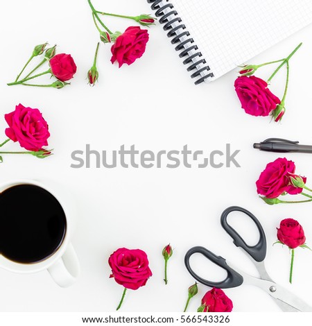 Feminine desk workspace frame with flowers bouquet, notebook, pen, scissors and coffee mug isolated on white background. Flat lay, Top view