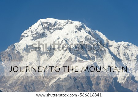 TRAVEL HAPPLY MUST TRAVEL LIGHT word over the background of the mountain. Motivation quotes for Travel and Adventure.
