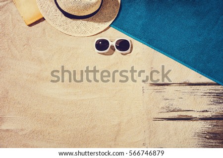 Top view of sandy beach frame. Background with copy space and visible sand texture.