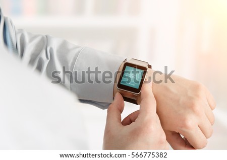 Man using smartwatch with e-mail notifier. smartwatch hand device notify computer internet message e-mail concept Royalty-Free Stock Photo #566775382
