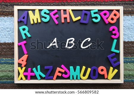 Blackboard with colorful alphabet.