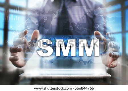 Businessman using tablet pc and selecting smm.