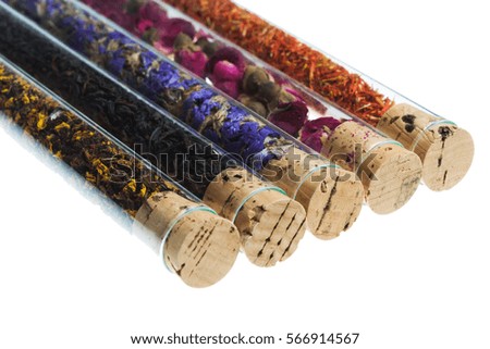 Spices in a test tube isolated on white background.