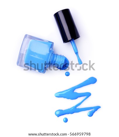 Spilled blue nail polish as sample of cosmetics product isolated on white background