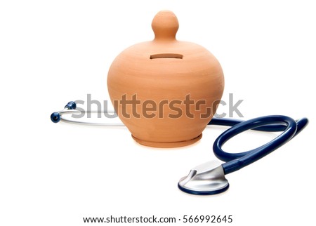 stethoscope and money box isolated on white