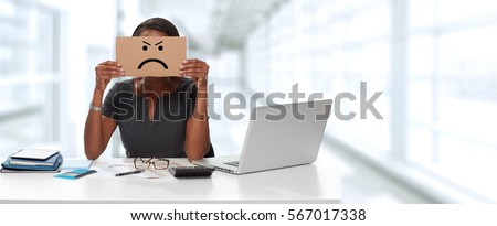 woman with angry cardboard on face
