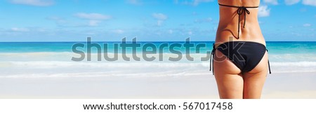 Woman butt on the beach