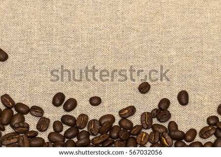 The Coffee beans on vintage linen background