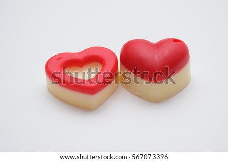 Red heart made of white chocolate on Valentine's Day.