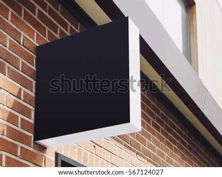 Signboard Shop Mock up Black Sign Display Building exterior brick wall