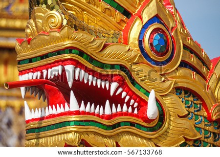 Statue of Naga or king of sneak a holy animal in Buddhist legend this picture taken in a public temple in Thailand.