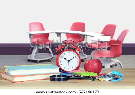 empty classroom in blurry background with book for back to school concept of education