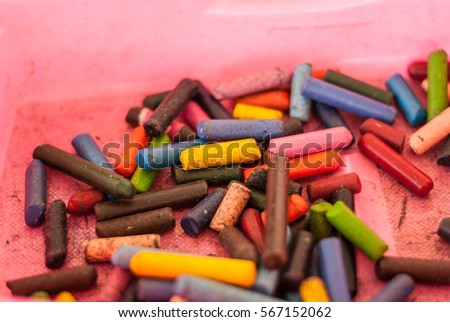 Crayons, color is broken to pieces.
