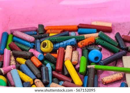 Crayons, color is broken to pieces.
