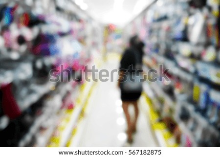 Picture blurred  for background abstract and can be illustration to article of Woman shopping at the supermarket
