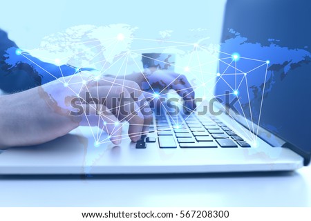 Modern technology concept. Man working with laptop at office Royalty-Free Stock Photo #567208300