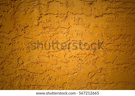 gold cement or concrete wall texture and background seamless