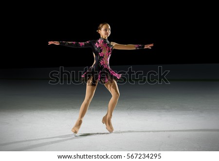 Young girl figure skater (on ice arena ver)
