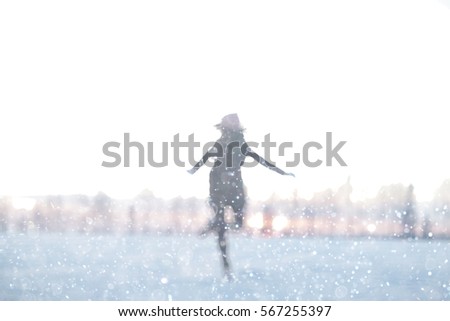 blurred background silhouettes of people fun winter nature