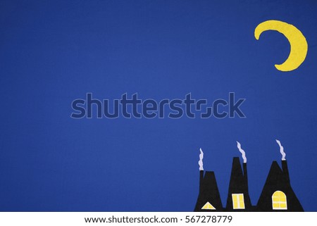small houses on the background of the moon. rag picture