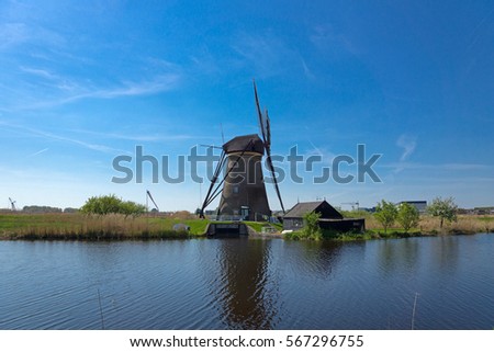 Historic Dutch windmills on the polders in Kinderdijk, South Holland, Netherlands, UNESCO World Heritage Site
