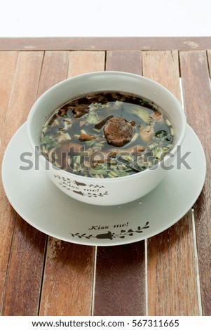 Ekaehla Duck Soup and brown rice on wood table,fast food 