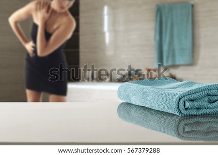 Desk of free space and woman in towel 
