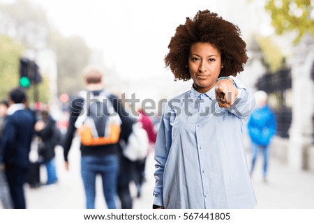 young black woman pointing front
