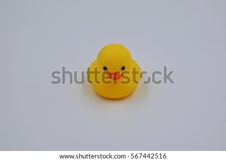 duck toy color yellow  on white background