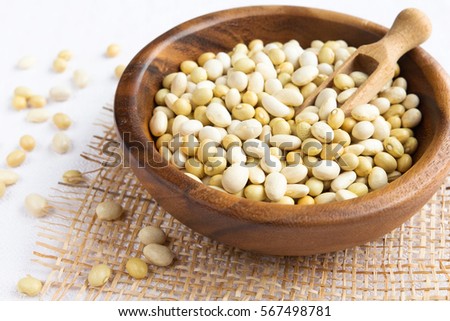 Legumes in a wooden plate rustic