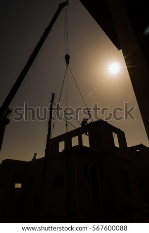 Silhouette background, Building activity in prefabricated system.