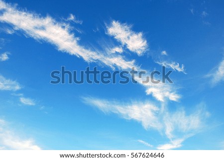 beautiful blue sky background with tiny clouds
