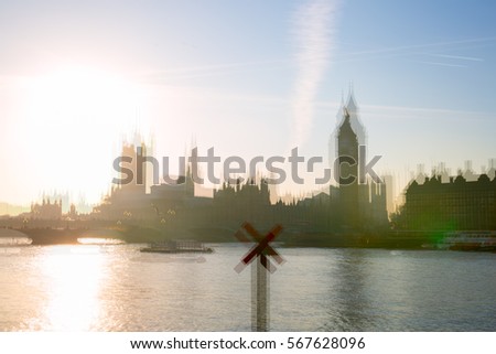 Double exposure image of Big Ben and Houses of Parliament at sunset. London