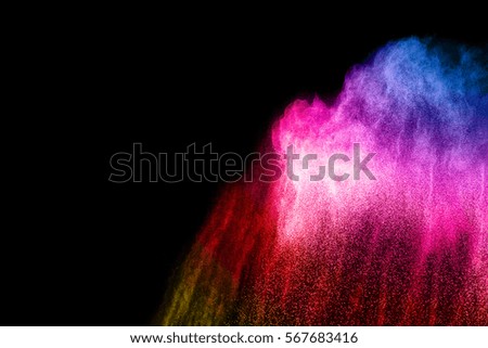 color powder explosion on black background. Mauve color cloud. color dust explode. Freeze motion paint Holi.