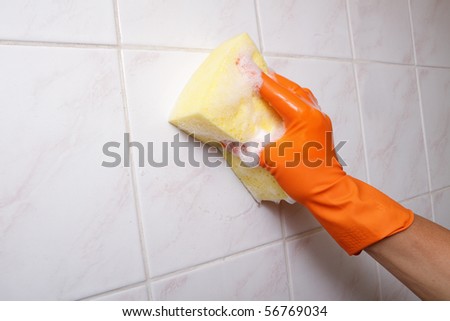 Cleaning tiles. Royalty-Free Stock Photo #56769034